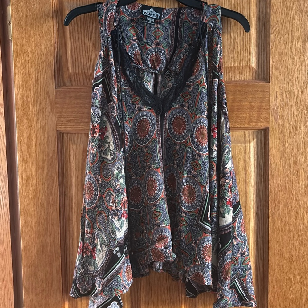 Angie loose bohemian top with racer back-like back.